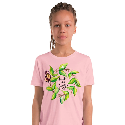 a childs tshirt with artwork of a butterfly's journey with text that reads trust the journey. 
